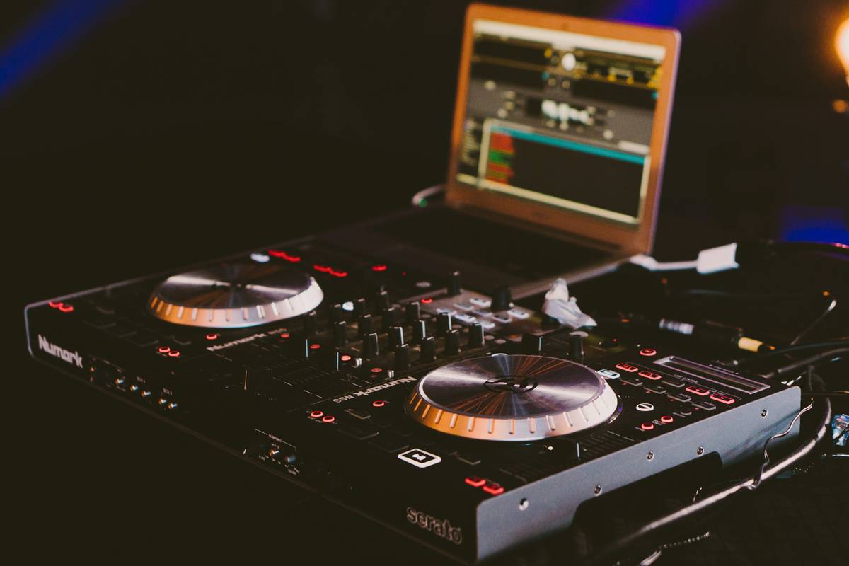 dj system with speakers setup on gaming desk featuring studio monitors and subwoofer
