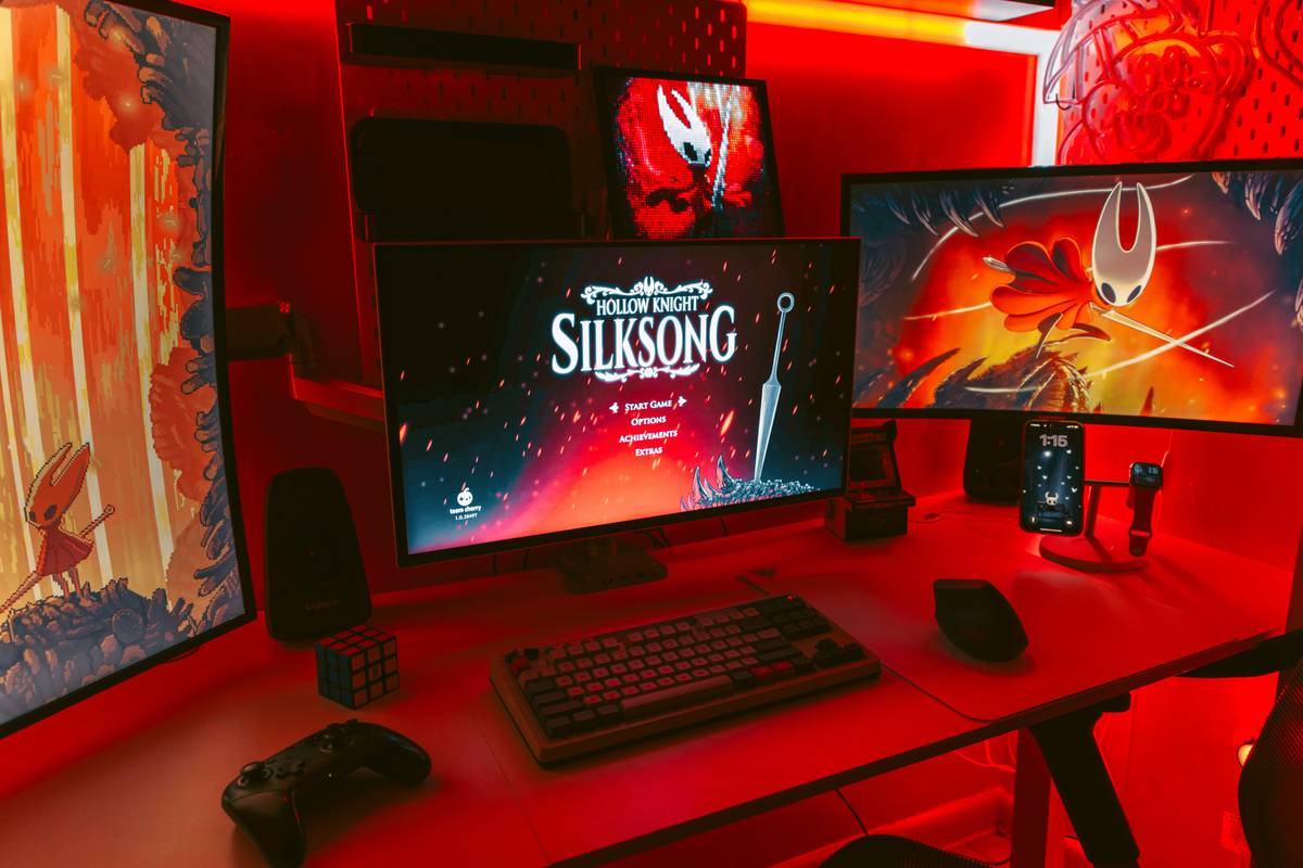 surround sound speakers for projector arranged around a gaming area with projector screen